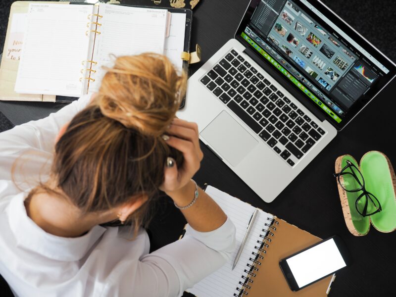 woman stressed out working computer