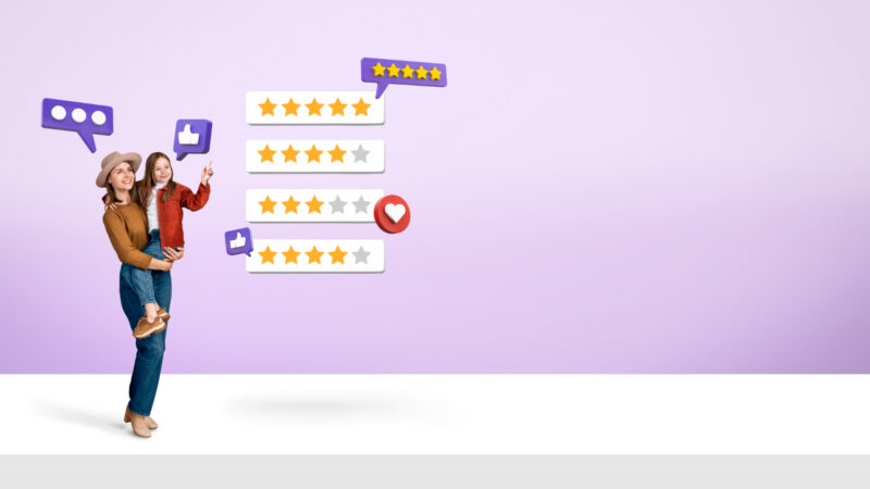 Full shot smiley mother and girl with good review stars.2